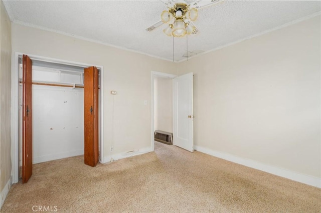 6016 Wilson Ave, South Gate, CA 90280 - unfurnished bedroom with carpet, baseboards, a textured ceiling, crown molding, and ceiling fan