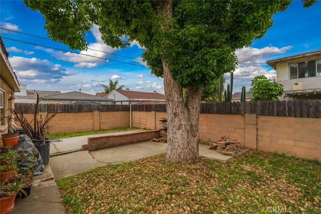 6016 Wilson Ave, South Gate, CA 90280 - fenced backyard featuring a patio area