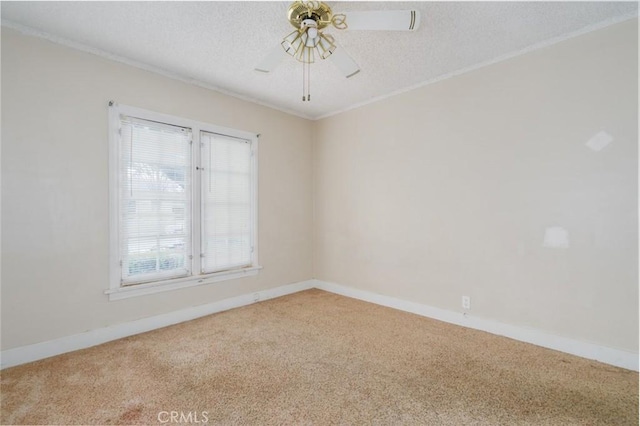 6016 Wilson Ave, South Gate, CA 90280 - empty room with plenty of natural light, carpet floors, ceiling fan, ornamental molding, and a textured ceiling