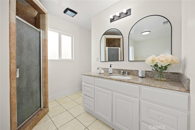 811 W San Marino Ave, Alhambra, CA 91801 - bathroom with vanity, a stall shower, tile patterned floors, and baseboards