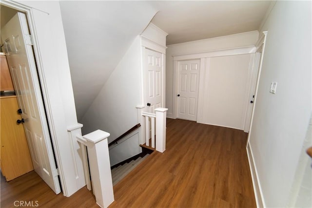 1023 S Wilton Pl, Los Angeles, CA 90019 - hallway featuring an upstairs landing, wood finished floors, and baseboards
