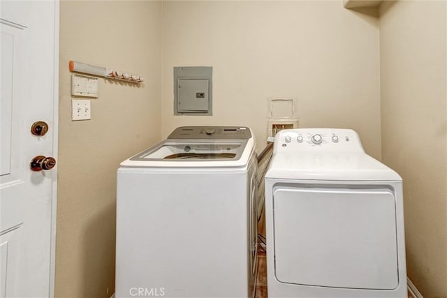 13580 Foothill Blvd Unit 1, Sylmar, CA 91342 - laundry area with electric panel and washing machine and dryer