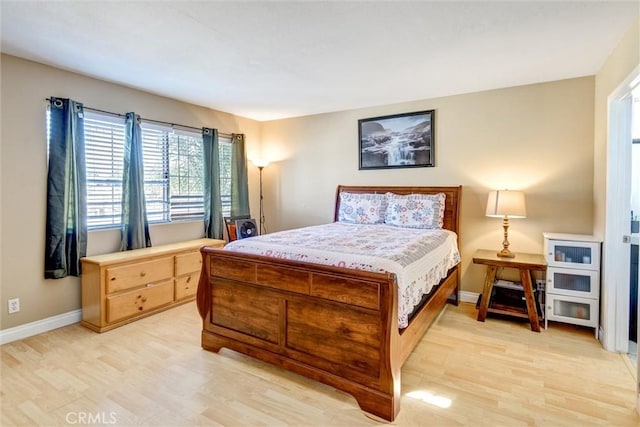 13580 Foothill Blvd Unit 1, Sylmar, CA 91342 - bedroom featuring light wood finished floors and baseboards