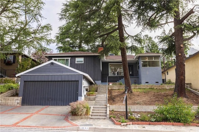 3035 Highridge Rd, La Crescenta, CA 91214 - view of front of property with a garage, concrete driveway, stairway, and a chimney