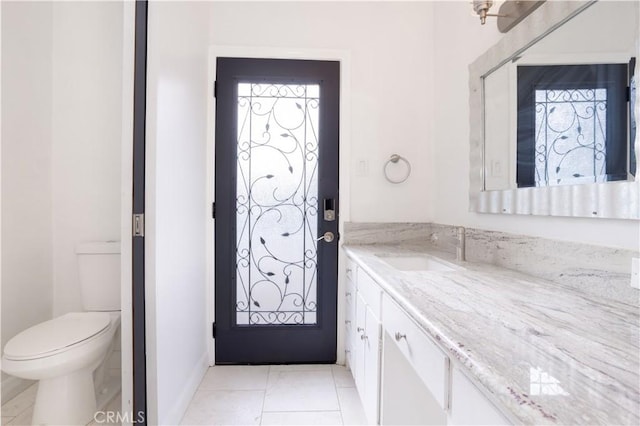 3035 Highridge Rd, La Crescenta, CA 91214 - bathroom with vanity, toilet, tile patterned floors, and baseboards