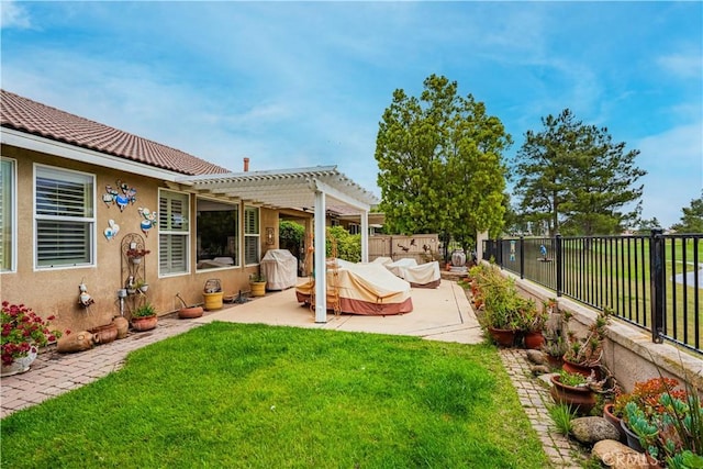 view of yard with a pergola and a patio area