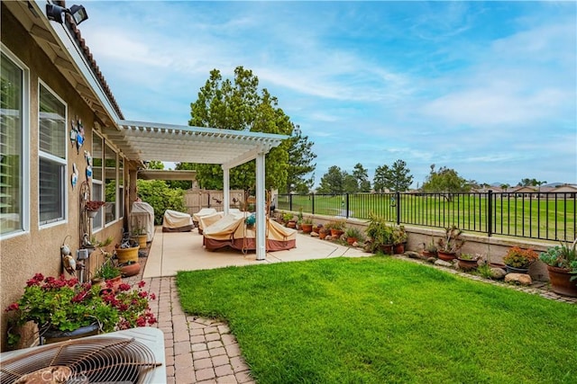 view of yard featuring a pergola, a patio area, and central air condition unit