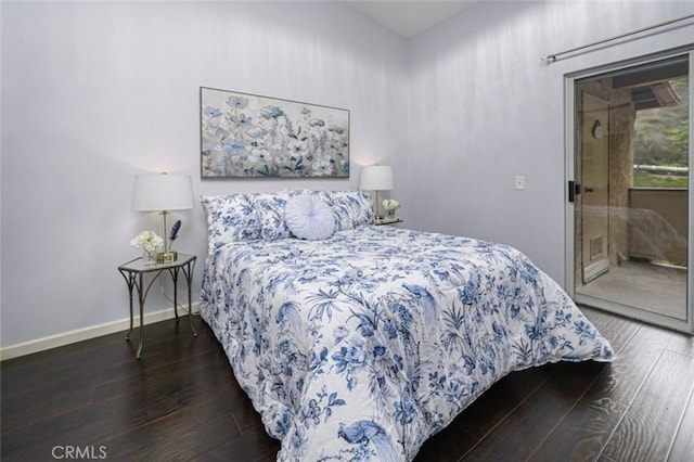 bedroom featuring hardwood / wood-style floors, baseboards, and access to outside