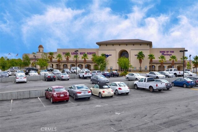 view of uncovered parking lot