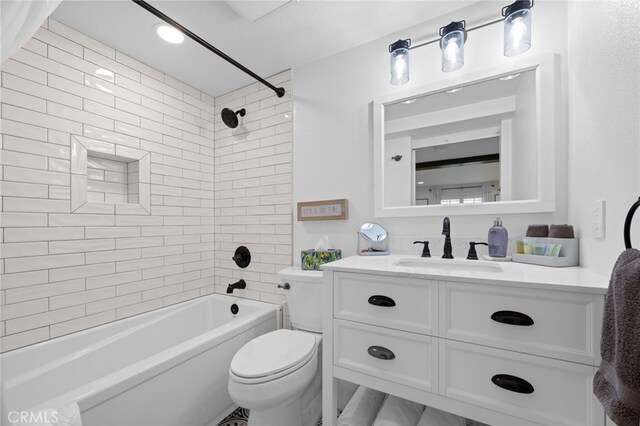 full bathroom with toilet, bathtub / shower combination, and vanity