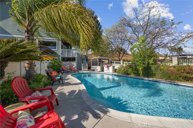 view of pool with a patio