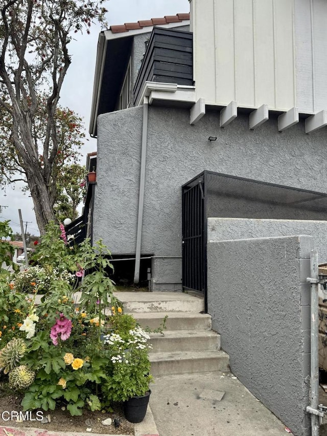 view of home's exterior with stucco siding