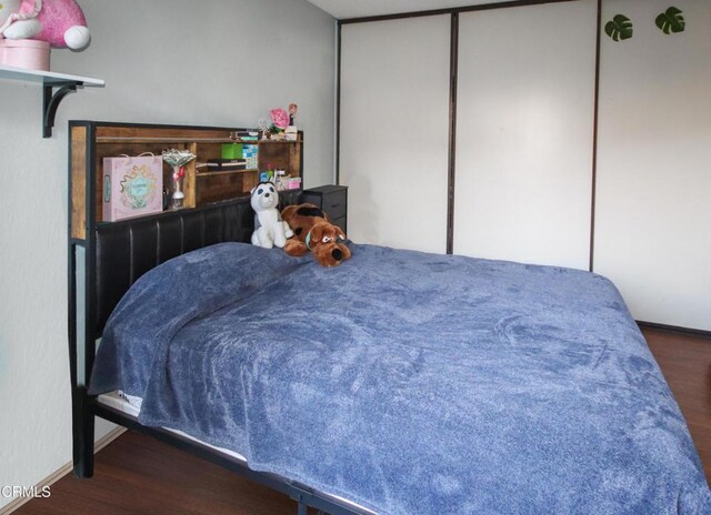 4578 Saviers Rd, Oxnard, CA 93033 - bedroom with wood finished floors and baseboards