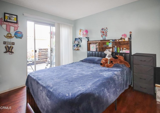 4578 Saviers Rd, Oxnard, CA 93033 - bedroom with access to exterior, wood finished floors, and baseboards