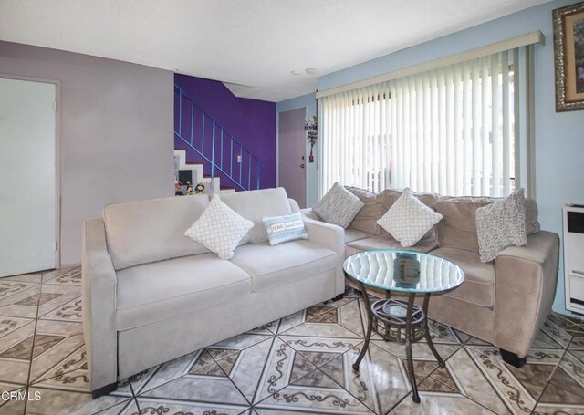 4578 Saviers Rd, Oxnard, CA 93033 - tiled living room featuring stairway