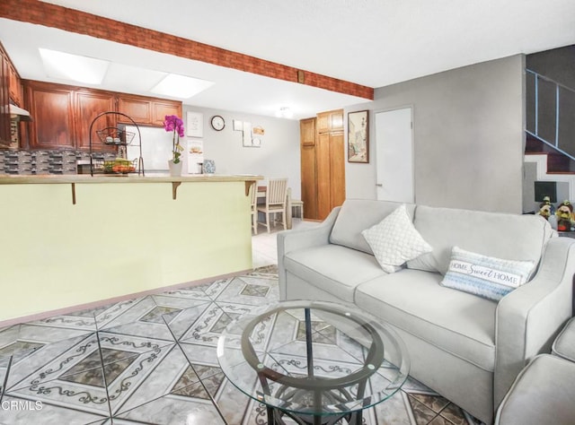 4578 Saviers Rd, Oxnard, CA 93033 - living area featuring light tile patterned floors and stairway