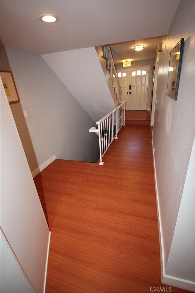 220 S Guadalupe Ave Unit 5, Redondo Beach, CA 90277 - corridor featuring wood finished floors, baseboards, stairway, and recessed lighting