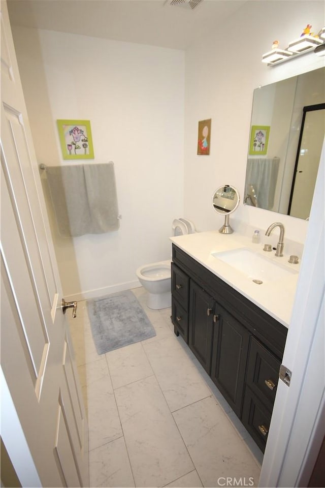 220 S Guadalupe Ave Unit 5, Redondo Beach, CA 90277 - bathroom featuring marble finish flooring and vanity