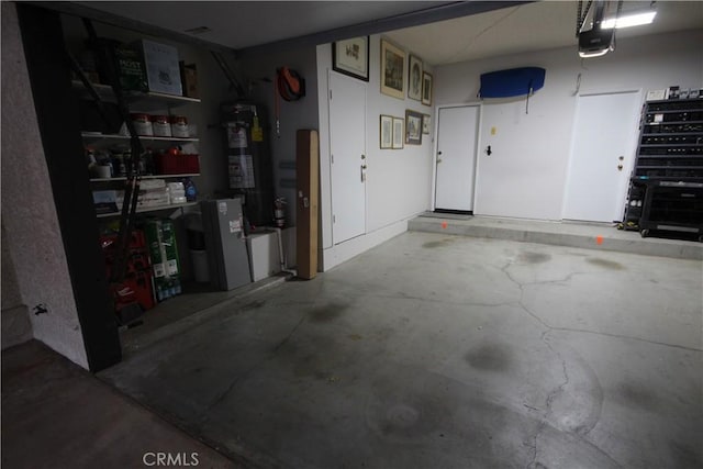 220 S Guadalupe Ave Unit 5, Redondo Beach, CA 90277 - garage featuring water heater and a garage door opener