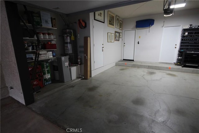 220 S Guadalupe Ave Unit 5, Redondo Beach, CA 90277 - garage with water heater and a garage door opener