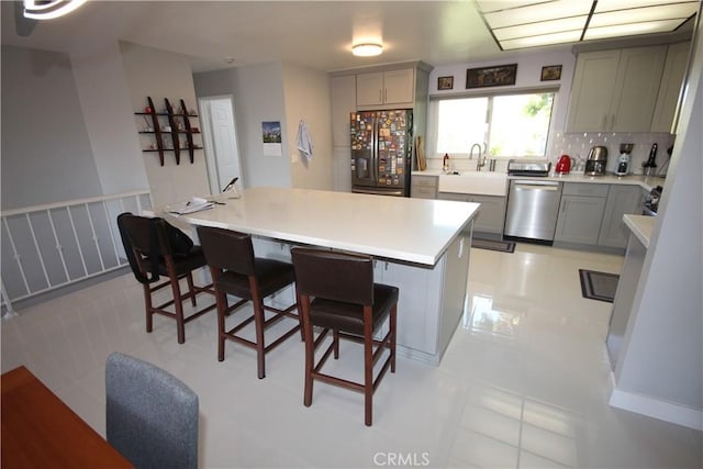 220 S Guadalupe Ave Unit 5, Redondo Beach, CA 90277 - kitchen with dishwasher, refrigerator with ice dispenser, a sink, and gray cabinetry