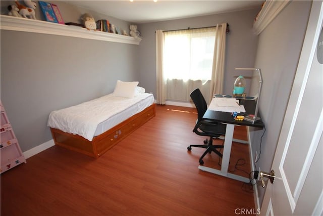 220 S Guadalupe Ave Unit 5, Redondo Beach, CA 90277 - bedroom featuring wood finished floors, a desk, and baseboards