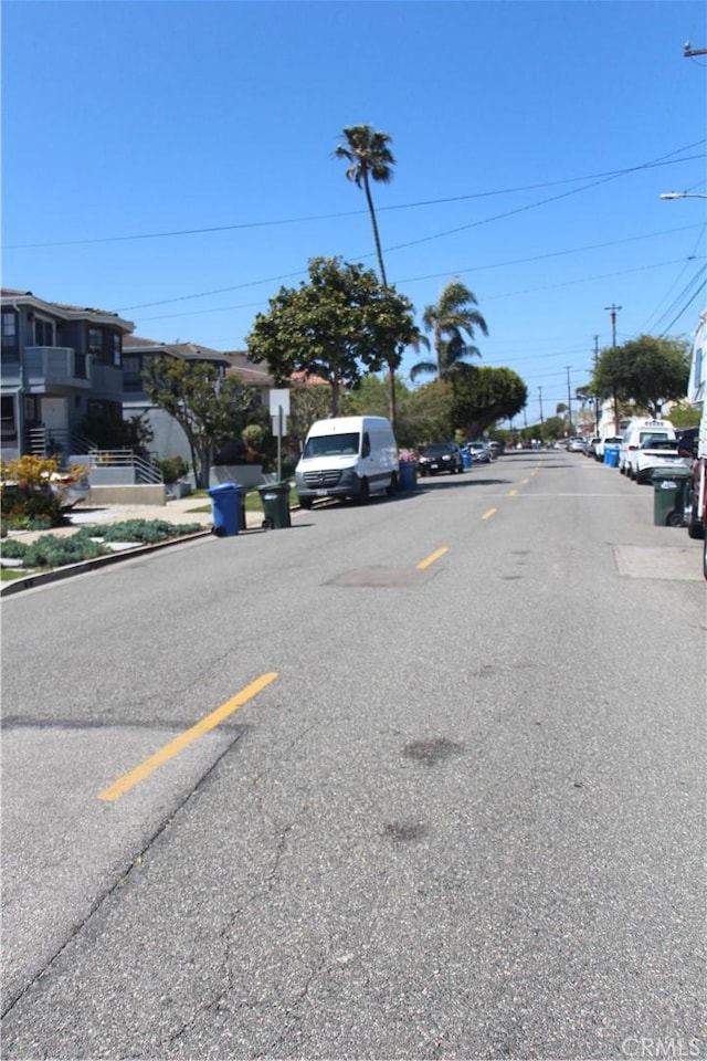 220 S Guadalupe Ave Unit 5, Redondo Beach, CA 90277 - view of asphalt street featuring street lights, curbs, and sidewalks