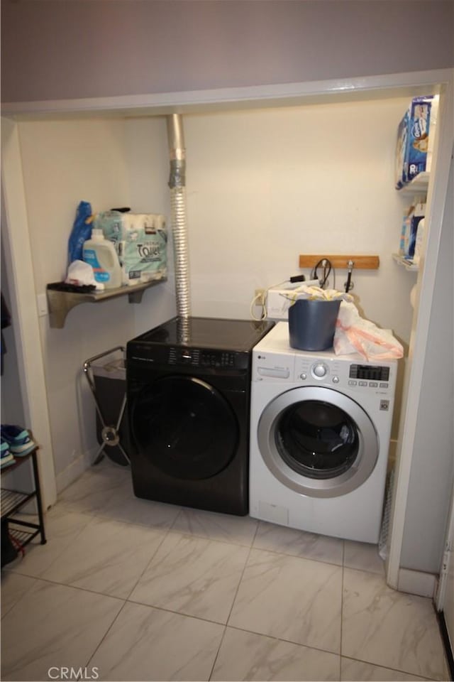220 S Guadalupe Ave Unit 5, Redondo Beach, CA 90277 - laundry room featuring washing machine and dryer and light marble finish floors