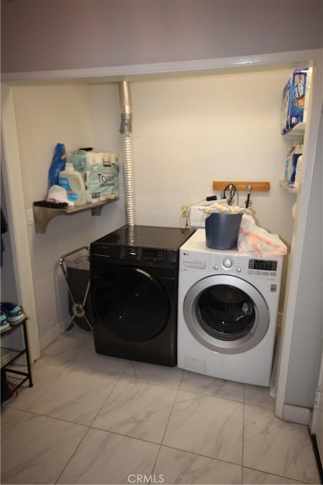 220 S Guadalupe Ave Unit 5, Redondo Beach, CA 90277 - laundry area with separate washer and dryer and light marble finish floors