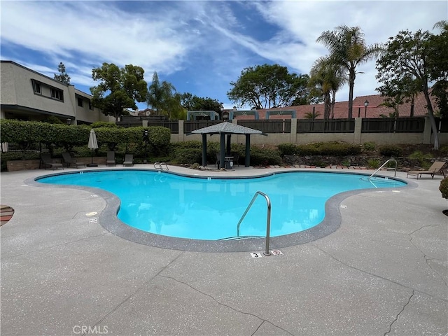 6990 Caminito Perico, San Diego, CA 92119 - community pool with a patio