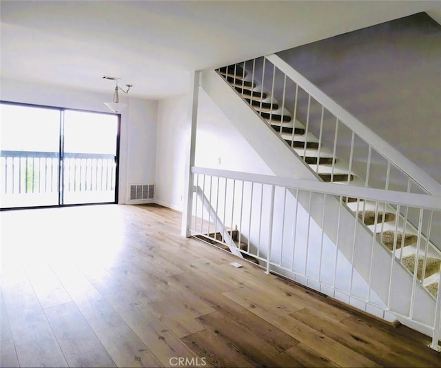 6990 Caminito Perico, San Diego, CA 92119 - stairs with wood finished floors