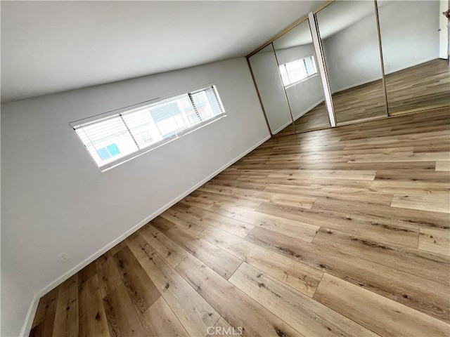 6990 Caminito Perico, San Diego, CA 92119 - unfurnished bedroom with hardwood / wood-style floors and baseboards