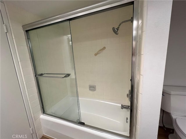 6990 Caminito Perico, San Diego, CA 92119 - bathroom with toilet and combined bath / shower with glass door