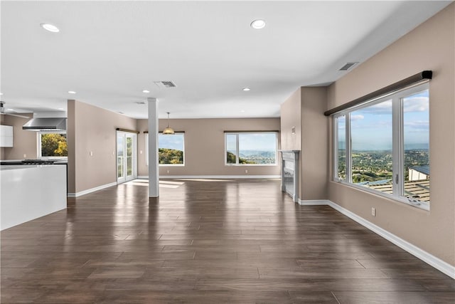 561 S Ventu Park Rd, Newbury Park, CA 91320 - unfurnished living room featuring recessed lighting and dark wood-style flooring