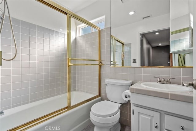 561 S Ventu Park Rd, Newbury Park, CA 91320 - full bath with tile walls, enclosed tub / shower combo, vanity, and tasteful backsplash