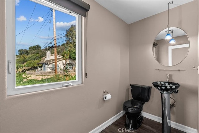 561 S Ventu Park Rd, Newbury Park, CA 91320 - bathroom with toilet and wood finished floors