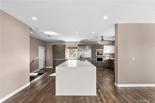 561 S Ventu Park Rd, Newbury Park, CA 91320 - kitchen with appliances with stainless steel finishes, modern cabinets, a ceiling fan, recessed lighting, and light countertops