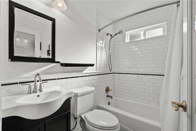 561 S Ventu Park Rd, Newbury Park, CA 91320 - full bathroom featuring shower / tub combo, vanity, and a wainscoted wall