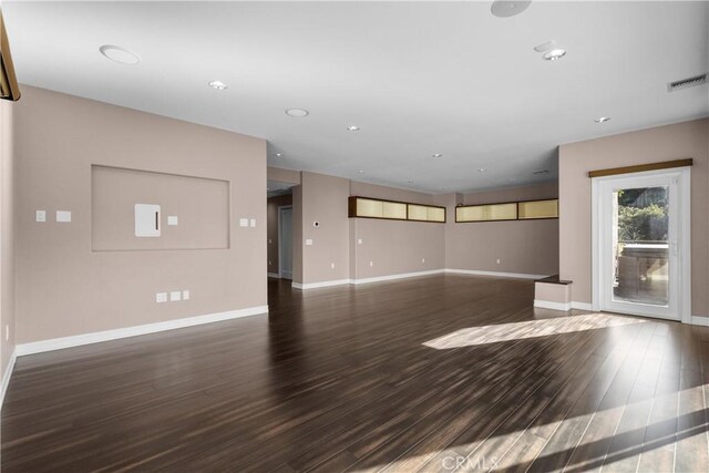561 S Ventu Park Rd, Newbury Park, CA 91320 - unfurnished living room featuring baseboards and wood finished floors