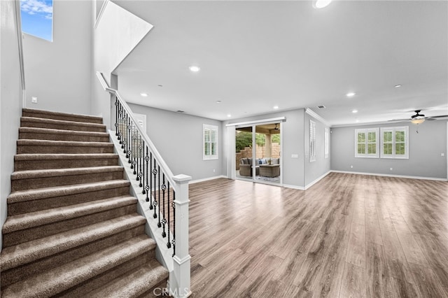 33378 Barmetta Ln, Temecula, CA 92592 - unfurnished living room featuring recessed lighting, stairway, wood finished floors, baseboards, and ceiling fan