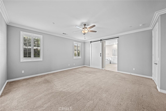 33378 Barmetta Ln, Temecula, CA 92592 - unfurnished bedroom featuring crown molding, light colored carpet, a barn door, baseboards, and ensuite bathroom