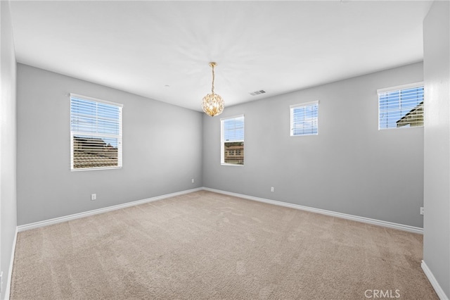 33378 Barmetta Ln, Temecula, CA 92592 - carpeted empty room featuring baseboards and a chandelier