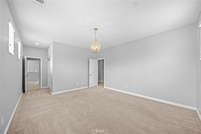 33378 Barmetta Ln, Temecula, CA 92592 - unfurnished bedroom featuring light carpet, baseboards, and a chandelier