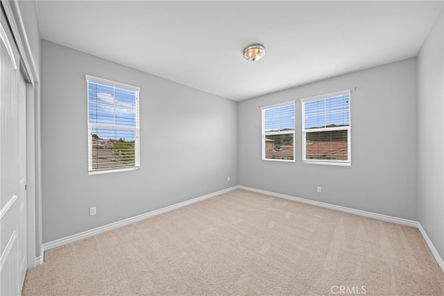33378 Barmetta Ln, Temecula, CA 92592 - unfurnished bedroom with carpet floors, multiple windows, and baseboards