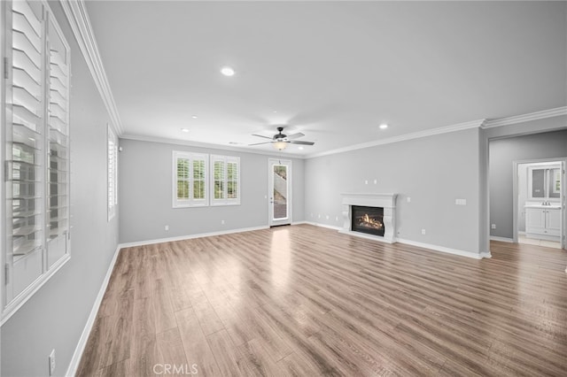 33378 Barmetta Ln, Temecula, CA 92592 - unfurnished living room with a ceiling fan, recessed lighting, baseboards, wood finished floors, and crown molding