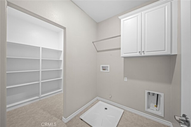 33378 Barmetta Ln, Temecula, CA 92592 - washroom featuring hookup for a gas dryer, cabinet space, washer hookup, baseboards, and carpet floors