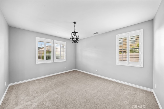 33378 Barmetta Ln, Temecula, CA 92592 - carpeted empty room featuring baseboards and a chandelier