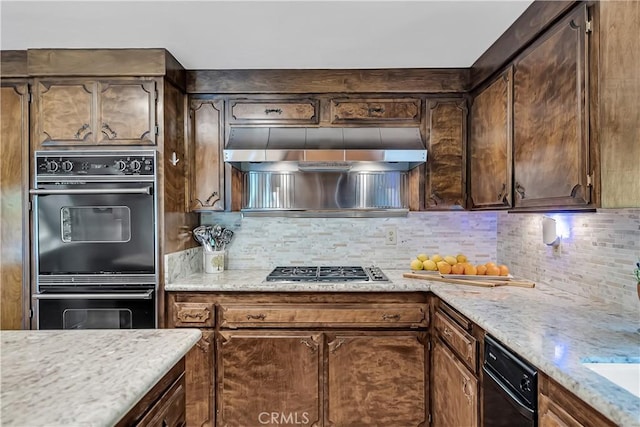 1475 Trenton Dr, Riverside, CA 92506 - kitchen featuring range hood, black appliances, backsplash, dark brown cabinetry, and light stone countertops