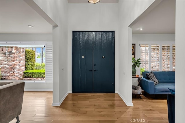 1475 Trenton Dr, Riverside, CA 92506 - entryway featuring wood finished floors, baseboards, and recessed lighting
