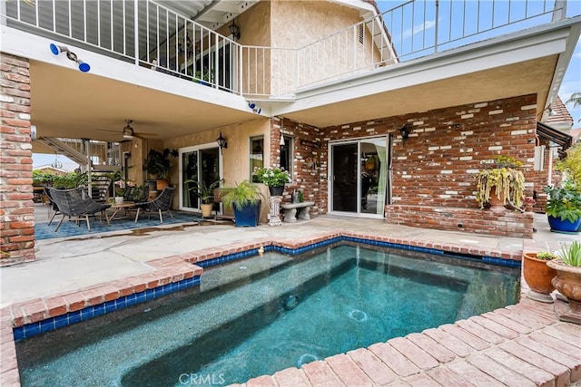 1475 Trenton Dr, Riverside, CA 92506 - swimming pool featuring a patio area and ceiling fan